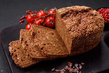 Delicious fresh crispy brown bread with seeds and grains