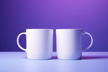 Two white coffee tea mug cup blank mock up on neon purple violet blue background. Product template...