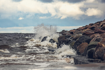 waves crashing on rocks