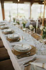Flower decoration for celebrations. Decoration of tables and chairs. Rustic decoration.