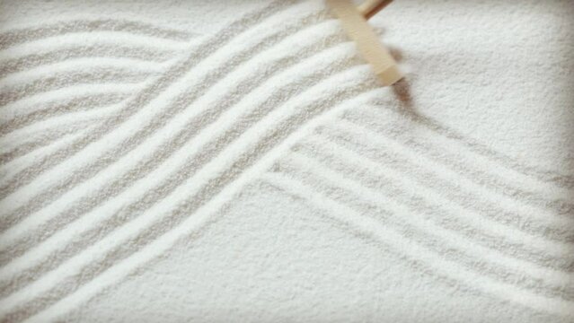 Making zen garden in white sand