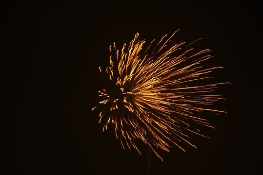 Firecrackers in action in the night sky during Deepavali or Diwali, Indian festival of lights