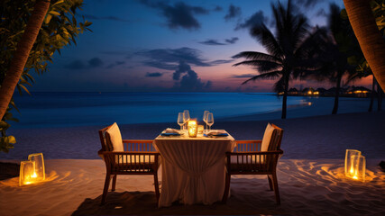 Romantic dinner on the beach in the evening at Maldives. - obrazy, fototapety, plakaty