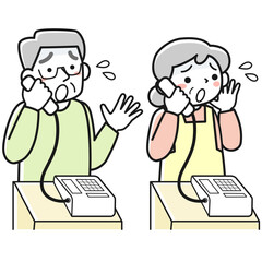 電話で話す困惑した表情のシニア女性とシニア男性のセット