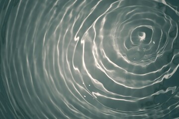 Defocus blurred transparent blue colored clear calm water surface texture with splashes reflection. Trendy abstract nature background. Water waves in sunlight with copy space. Blue watercolor shine.