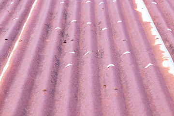 Abstract Texture background roof old galvanized sheet wall silver color with rusty tough metal. cannot withstand high humidity climates. Thin galvanized steel sheet, flat or corrugated.