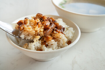 Braised meat over cooked rice, famous and delicious street food in Taiwanese restaurant.