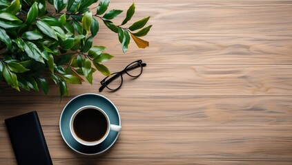 Coffee cup with notebook and glasses on wooden table background.