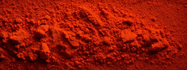 Foto op Canvas Red paprika chili powder seamless texture background. © Artem