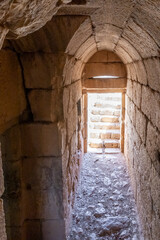 Fototapeta na wymiar Tunnel passage in the tower of the medieval fortress Nimrod - Qalaat al-Subeiba located near the border with Syria and Lebanon on the Golan Heights, in northern Israel