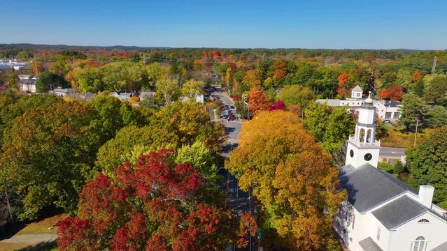 Wayland historic town center aerial view in fall with fall foliage at Boston Post Road and MA Route 27, including First Parish Church and Town Hall, Wayland, Massachusetts MA, USA. 