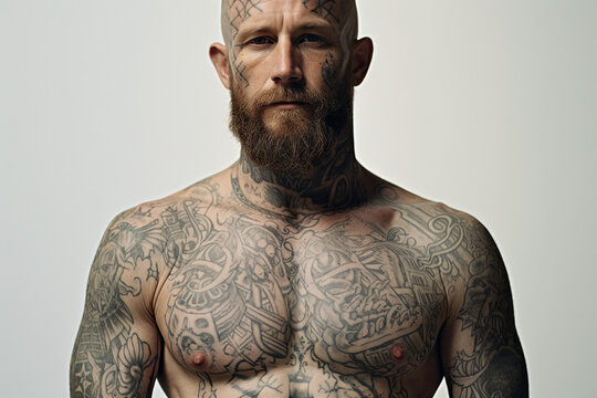 AI generated photo of muscular handsome man in tattoo studio isolated on black background