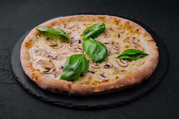 Mushroom pizza with cheese and basil