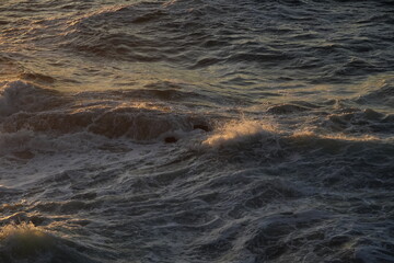 effects of waves and the ocean on the coast at sunset