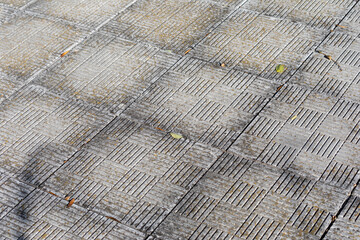 Fototapeta premium Pavement and the city. Texture, background, photo