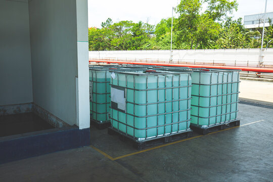 Chemistry white tank on pallets are storage in the warehouse factory