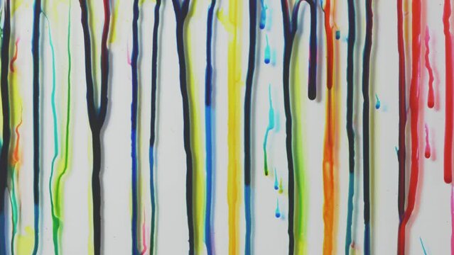 Colored smudges flow smoothly and unusually on a white background. Background for video