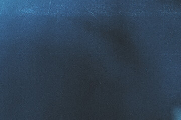Dark blue grainy gradient background, blurry color flow with noise texture. Digital grain soft noise and scrathes effect. Lo-fi vintage retro. Minimal style