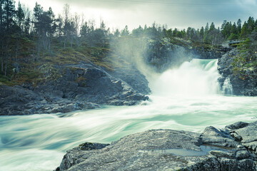 Stuttgongfossen, a powerful waterfall south of Vagamo, located at Hindsæte/Sjodalen in the region...