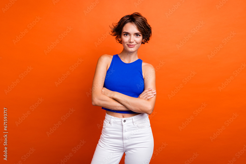 Sticker photo of cool confident lady wear blue singlet smiling arms crossed isolated orange color background