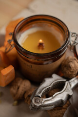 Candle on the table. Autumnal background. Thanksgiving day.
