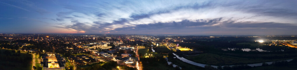 Fototapeta na wymiar Gorgeous High Angle View of Illuminated British City at Just After Sunset