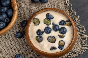 ripe blueberries and fresh creamy yogurt