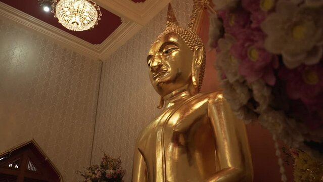 Phra Buddha Trirattananayok or Luang Pho To Golden Buddha statue in the ordination hall of Wat Kalayanamit Woramahaviharn.
