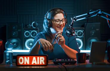 Happy DJ hosting a radio show