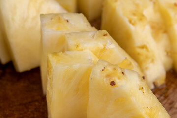 Sliced pieces of ripe yellow pineapple