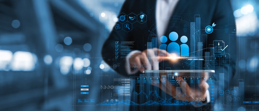 Human resource management, business man using tablet Effective personnel management and recruitment, effective organizational structure, organizational leadership and team building.