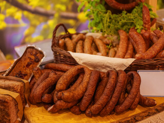 Different types of homemade smoked dry sausages
