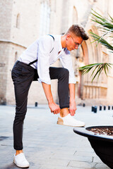 Man posing in gothic quarter of Barcelona