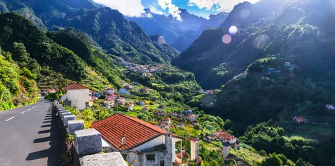Poster Stunning nature scenery of volcanic Madeira island. Green mountains, scenic Boaventura village © Freesurf