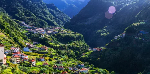 Poster Stunning natural beauty of volcanic Madeira island. Green mountains, scenic Boaventura village © Freesurf