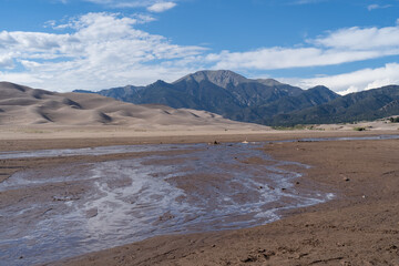 Medano Creek beach in Great Sand Dunes National Park in Colorado on a sunny summer day