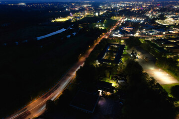 Fototapeta premium Gorgeous High Angle View of Illuminated British City at Just After Sunset