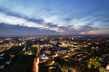 Gorgeous High Angle View of Illuminated British City at Just After Sunset