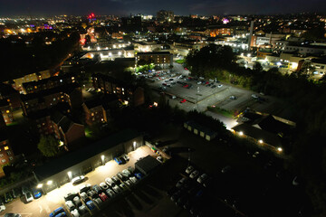Fototapeta premium Gorgeous High Angle View of Illuminated British City at Just After Sunset