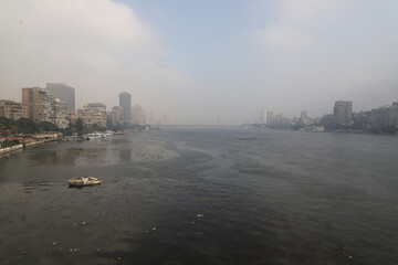 Naklejka premium The Nile, river, fog, buildings