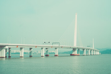 View of the Bridge over Shenzhen Bay, Houhai Bay to Hong Kong Island. Retro style