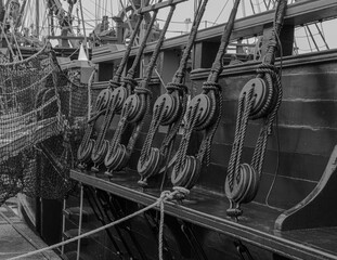 Black and white photo of rope fasteners on the hull of a Corsair frigate, Brittany, FRANCE.