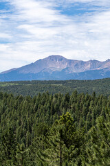 Pike's Peak as viewed from Lovell Gulch Trail in Pike National Forest near Woodland Park and Colorado Springs, CO on a sunny summer afternoon