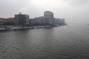 Obraz premium The Nile, river,fog, buildings