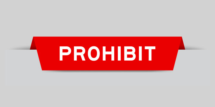 Red color inserted label with word prohibit on gray background