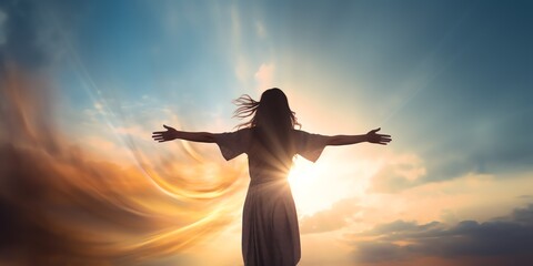 a woman with her arms outstretched in front of the sun - obrazy, fototapety, plakaty