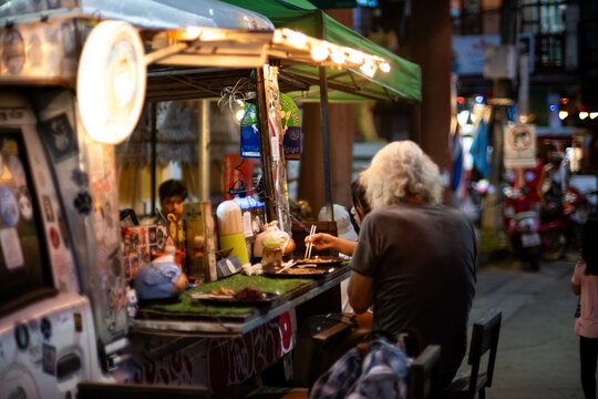 MAE HONG SON, THAILAND - October 30, 2023: Night Market in Pai, nothern Thailand. Pai walking street market, is a food and craft market that operates every night.