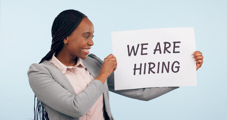 Black woman with we are hiring poster, human resources and opportunity for job on blue background....