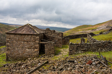 The ruins of Crackpot Hall, an 18th century farmhouse that has been abandoned to dereliction for many decades. near Keld, Upper Swaledale, North Yorkshire, UK