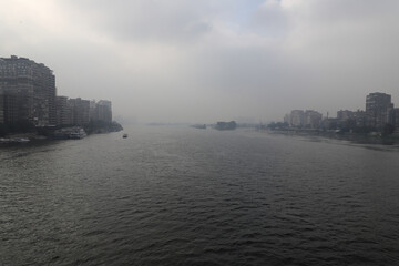 Fototapeta premium The Nile, river, fog, buildings